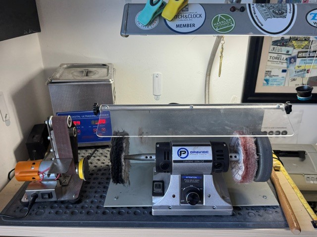 Watch polishing and ultrasonic cleaning setup at Toto's Vintage Watches